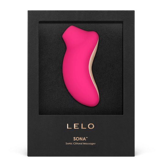 A pink, sleek sonic massager named 'LELO Sona' displayed in its black packaging with a gold accent, indicating it is a high-quality clitoral stimulator.