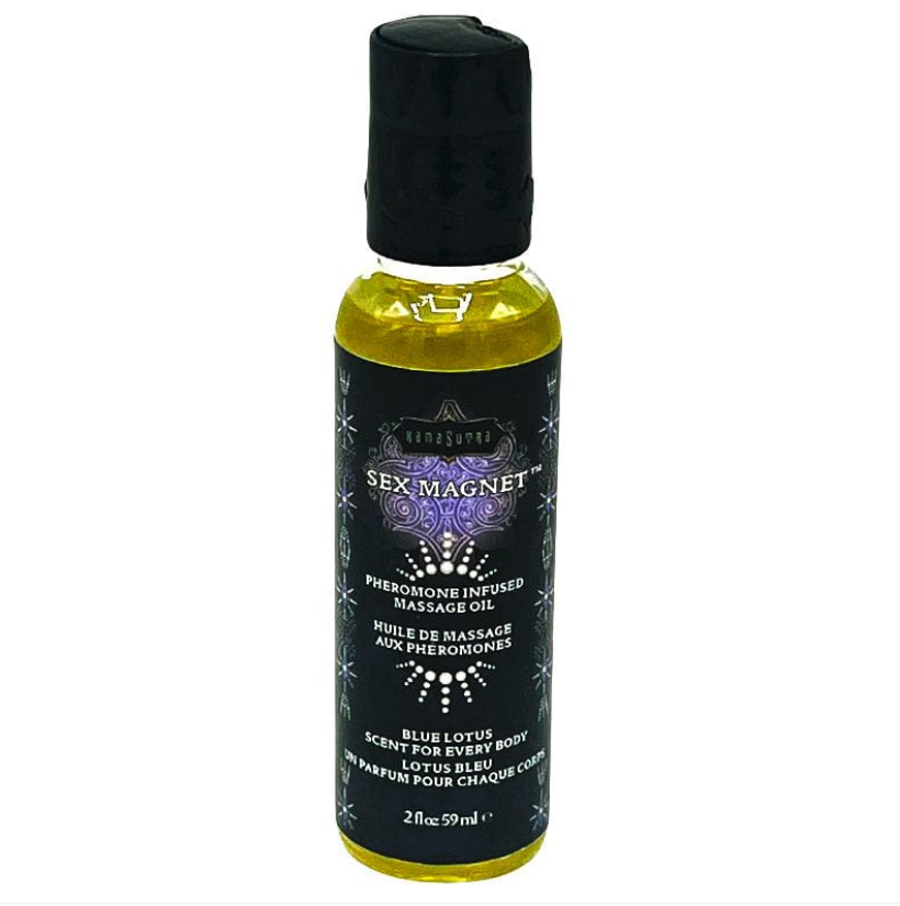 A bottle of Kama Sex Magnet Blue Lotus Massage Oil with a black cap and a yellow label, featuring text and the brand's logo.