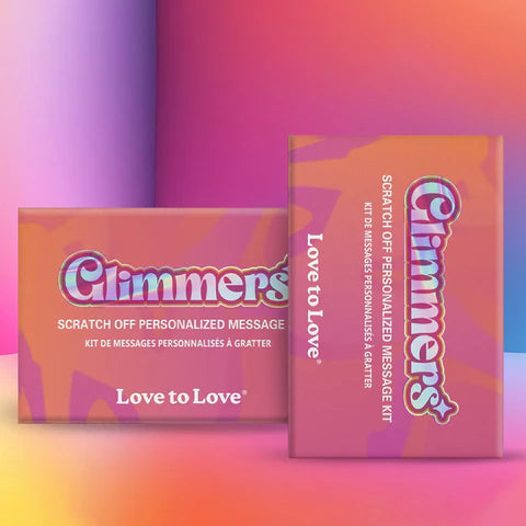 The image shows two boxes of the product 'Climmers', one with the text 'Love to Love' visible, indicating a scratch-off game kit for personalized messages. The background is colorful with shades of pink and purple.