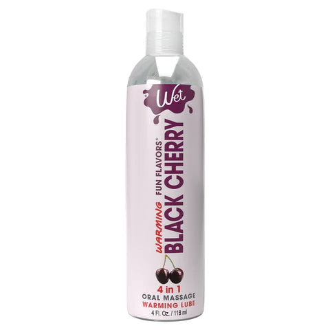 Bottle of 'Wet' warming black cherry oral lubricant on a white background