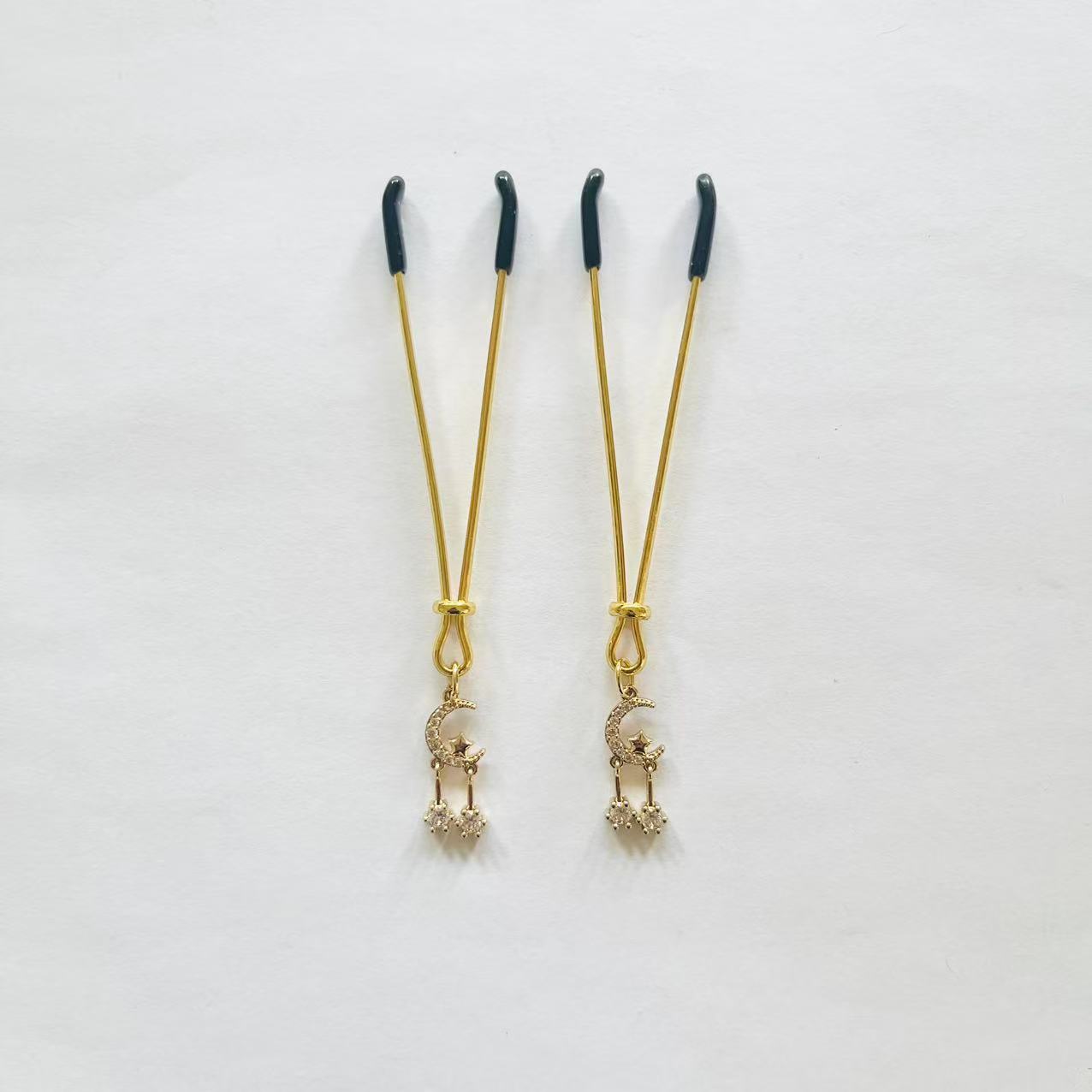 Gold nipple clamps with rhinestone crescent moon and double dangling star chains – PurpleNight.ca