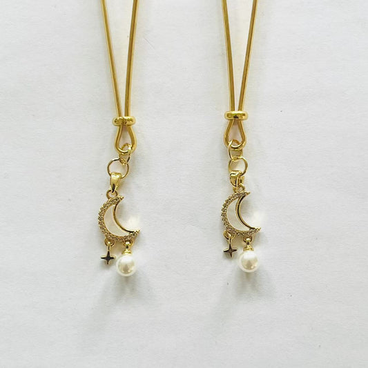 Gold nipple clamps with crescent moon, star charm, and pearl drop – PurpleNight.ca