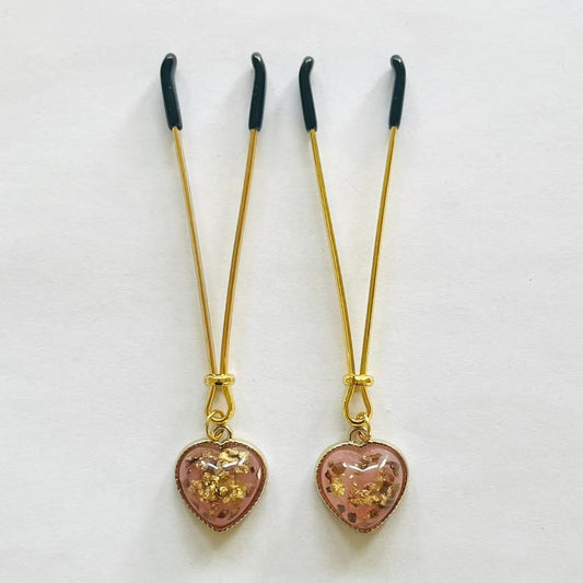 Gold nipple clamps with pink heart charm and embedded gold foil – PurpleNight.ca
