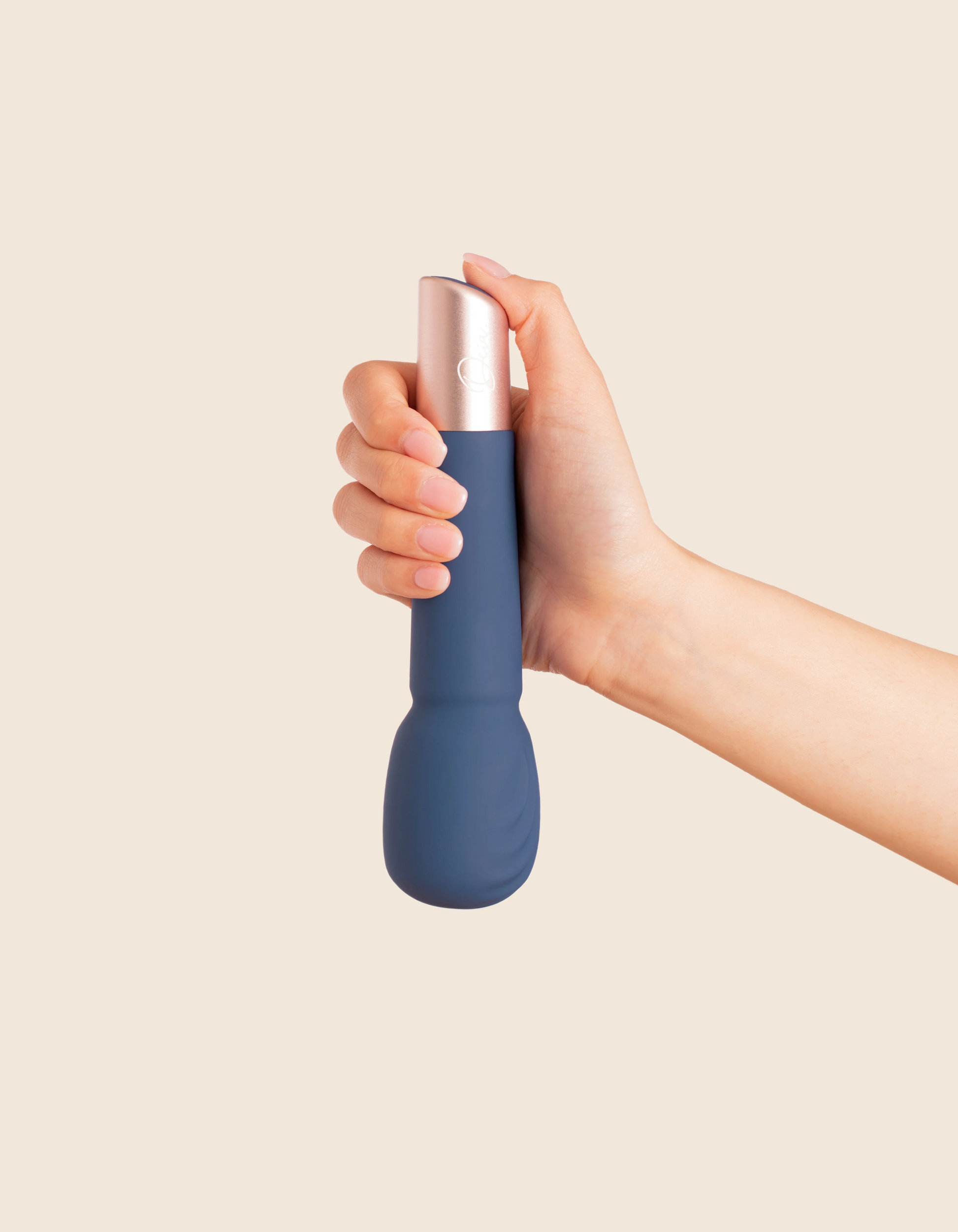 Deia Wand vibrator with soft-touch finish and display base