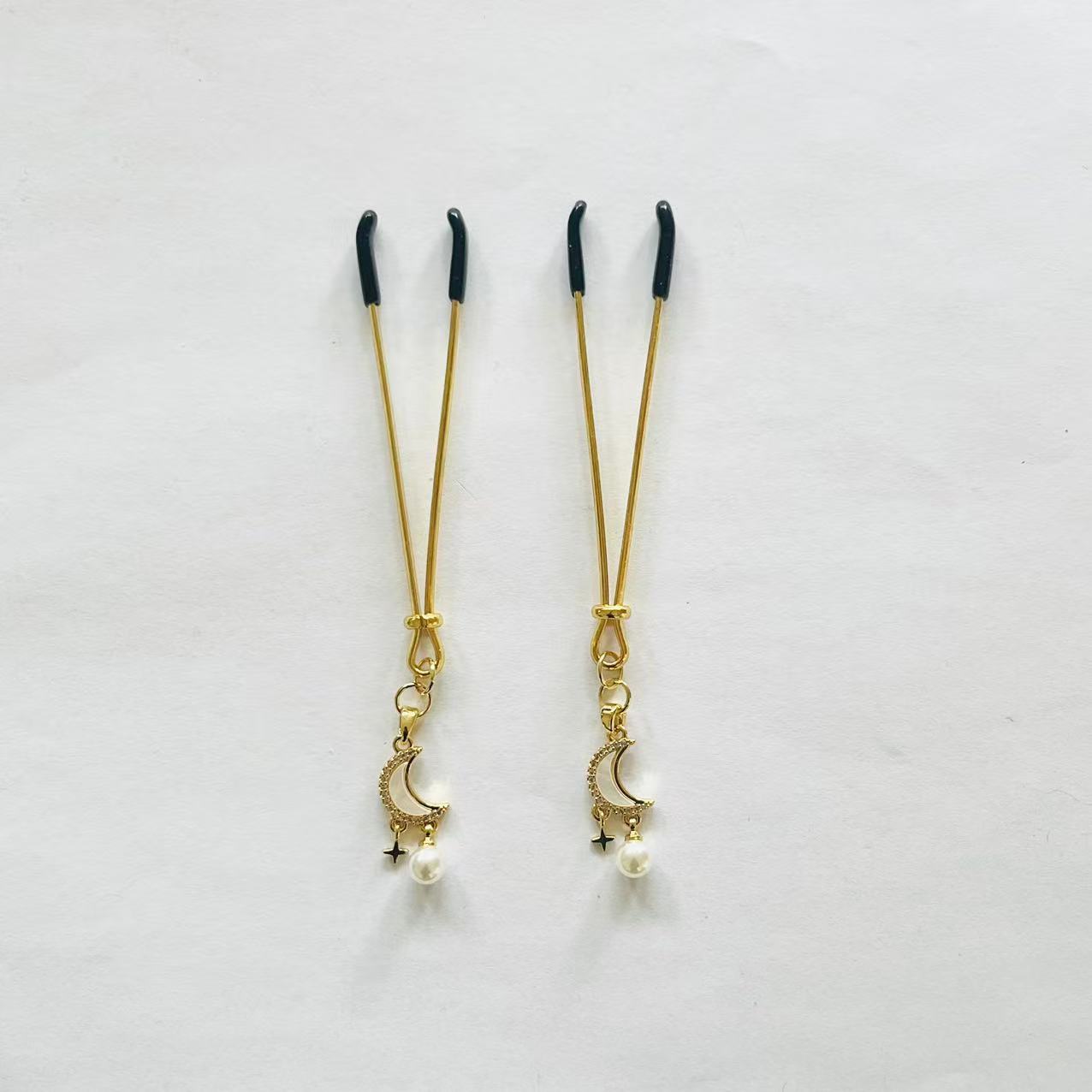 Gold nipple clamps with crescent moon, star charm, and pearl drop – PurpleNight.ca