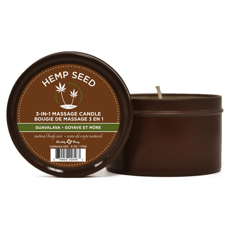 A round tin massage candle with a brown label that reads 'Hemp Seed' and 'ZIN-I MASSAGE CANDLE BOUGE DE MASSAGE 3 GUAVALA' indicating a hemp seed-based candle with a massage oil function. The candle is visible in the background, and the label includes product information and a barcode.