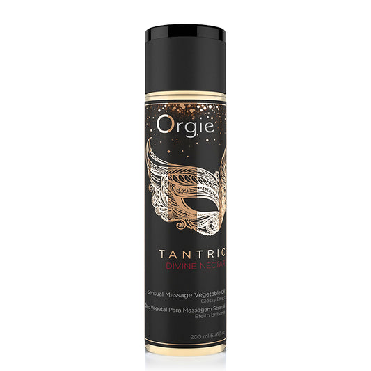 A can of Orgie Tantric Divine Nectar massage oil with a black and gold design, indicating it is a luxury product intended for massage.