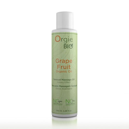Bottle of Orgie Bio Massage Oil with Grape Fruit label, indicating it is a certified organic product.