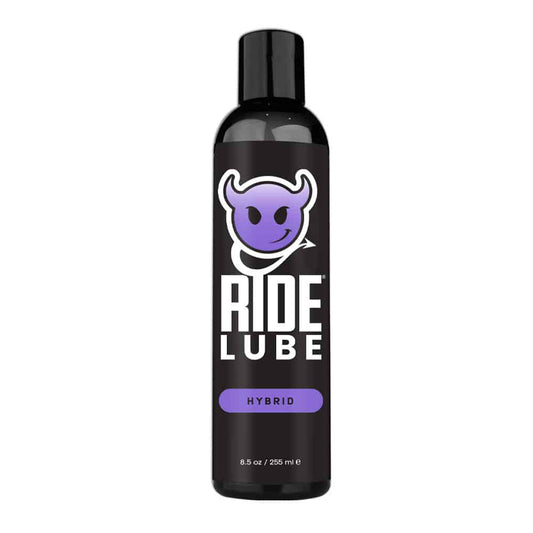 Ride Lube bottle with a black label featuring a purple logo on a white background