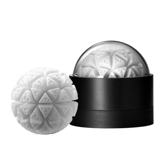 The image shows a male masturbator with a unique, geometric ice-like pattern on the exterior. It is displayed next to its black, sleek case which is likely to contain the product.