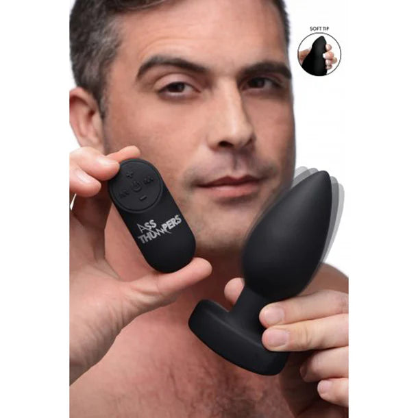 Ass Thumpers The Taper 10X Smooth Vibrating Plug – Black silicone anal plug with remote control, tapered design, and 10 vibration modes.