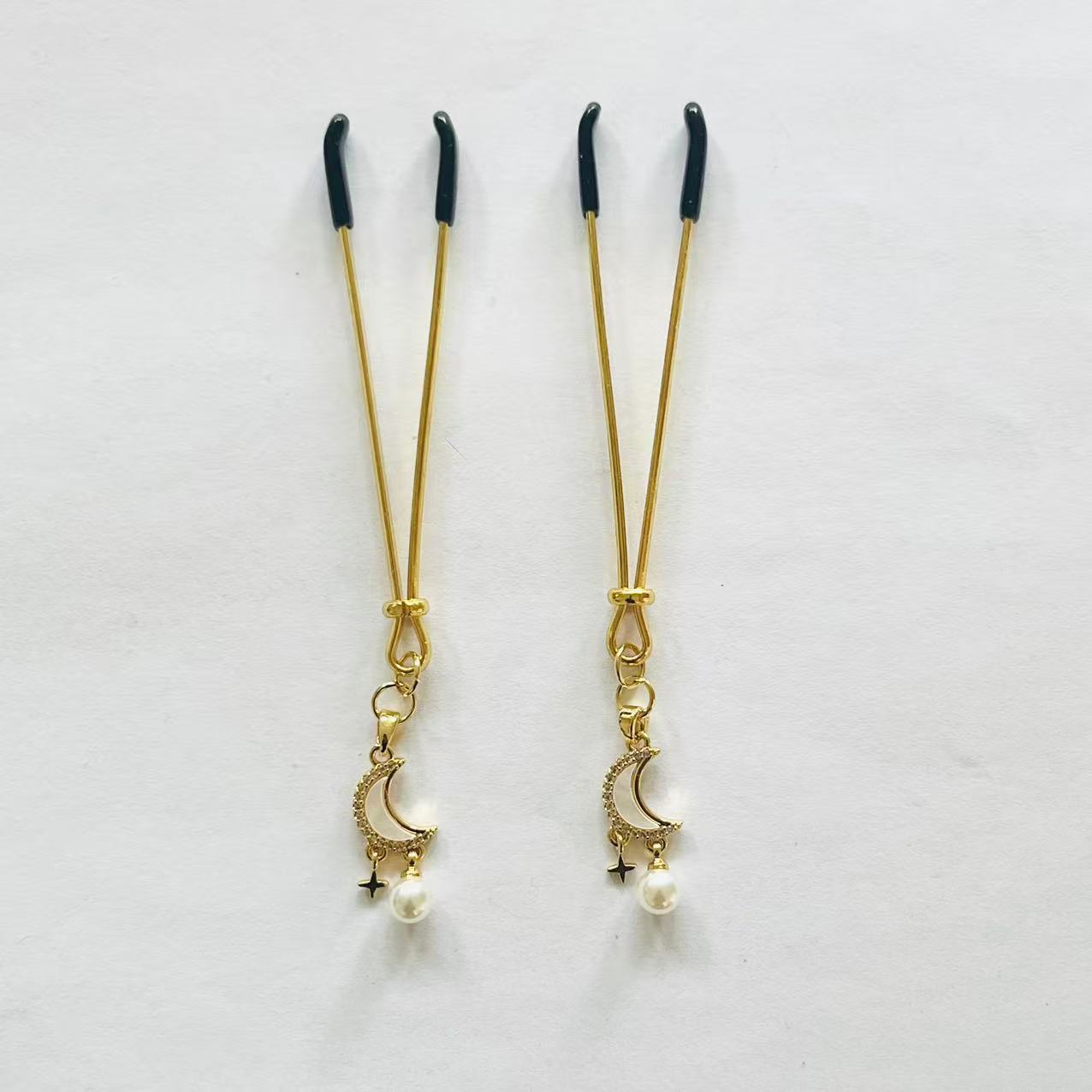 Gold nipple clamps with crescent moon, star charm, and pearl drop – PurpleNight.ca