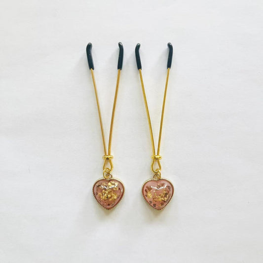Gold nipple clamps with pink heart charm and embedded gold foil – PurpleNight.ca