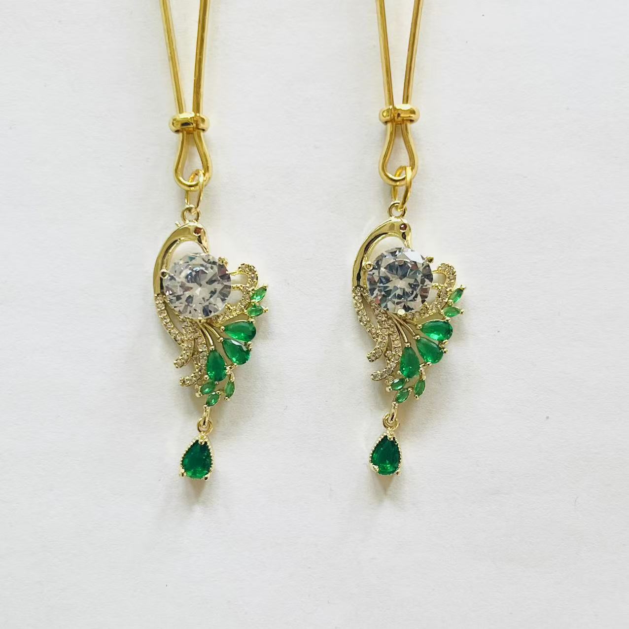 Peacock design gold nipple clamps with green gemstone feathers and emerald teardrop – PurpleNight.ca