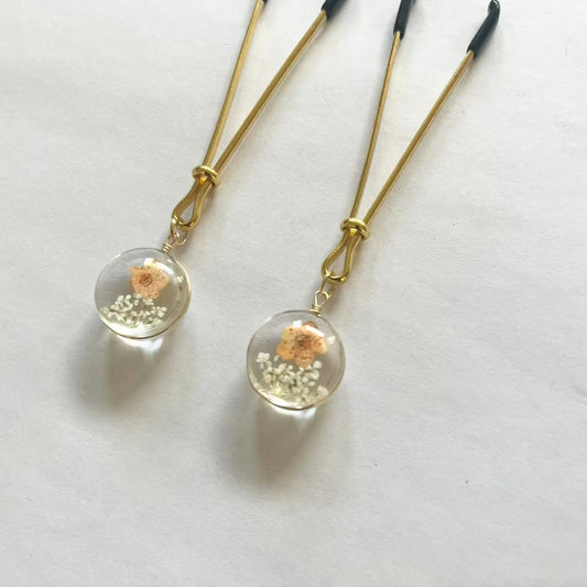 Gold nipple clamps with globe resin charm containing dried flowers – PurpleNight.ca