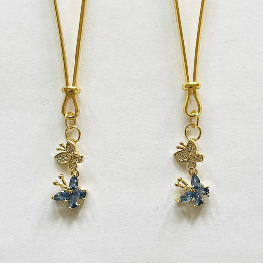 Elegant gold nipple clamps with blue crystal flower and butterfly charm – PurpleNight.ca