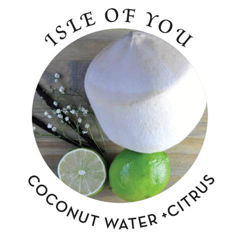 Coconut and limes on a wooden board with 'Isle of You' branding.