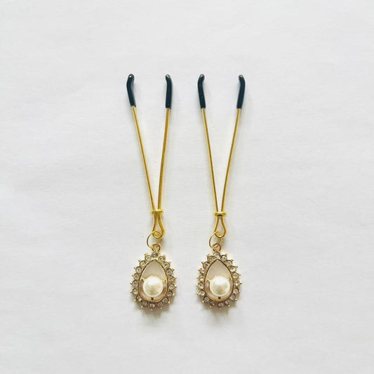 Gold nipple clamps with teardrop charm and faux pearl center – PurpleNight.ca