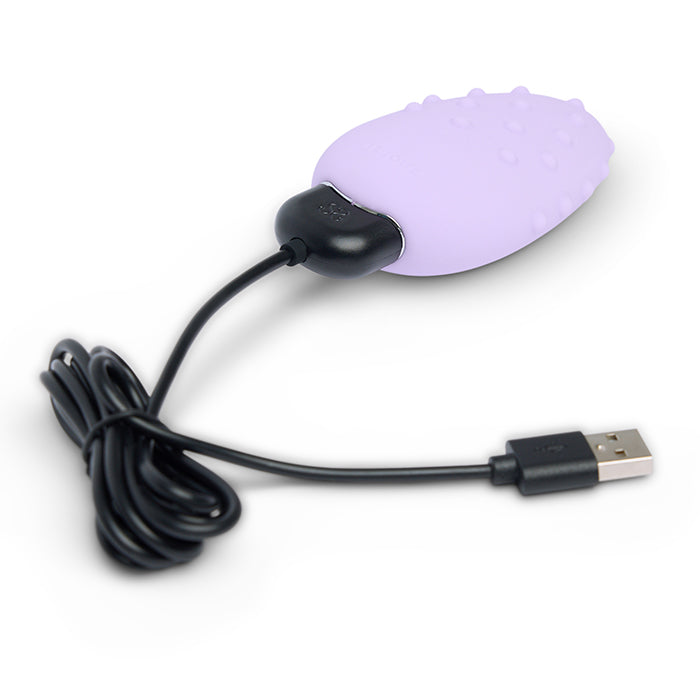 Mimi Deux in hand, showing compact, discreet shape