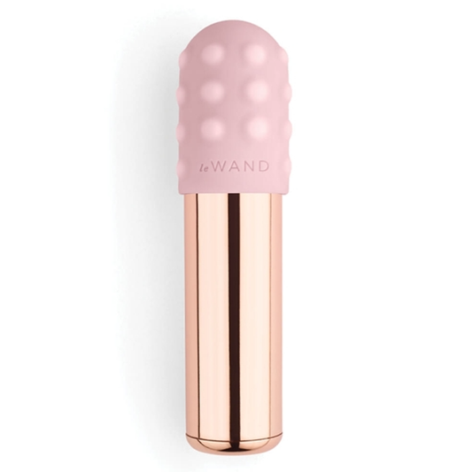 A rose gold-colored Le Wand Bullet Vibe, featuring a smooth, tapered design with a single button at the base and a silicone band near the top.