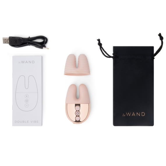 Dual-motor mini vibrator with textured silicone sleeve