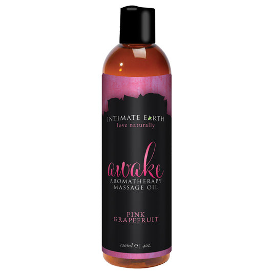 A bottle of Intimate Earth Massage Oil Awake with grapefruit, indicating organic and naturally infused with essential oils.