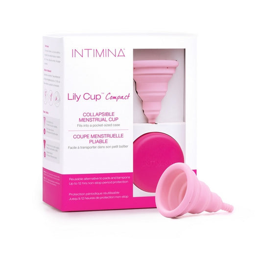 Pink collapsible menstrual cup with Intimina packaging on a white background