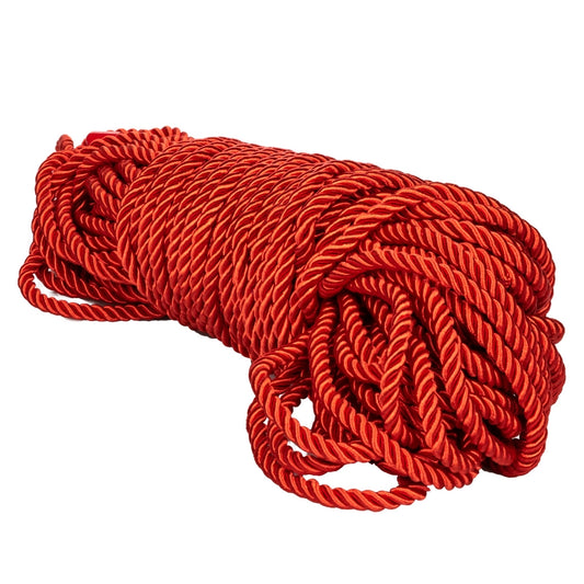 Red rope coiled on a white background