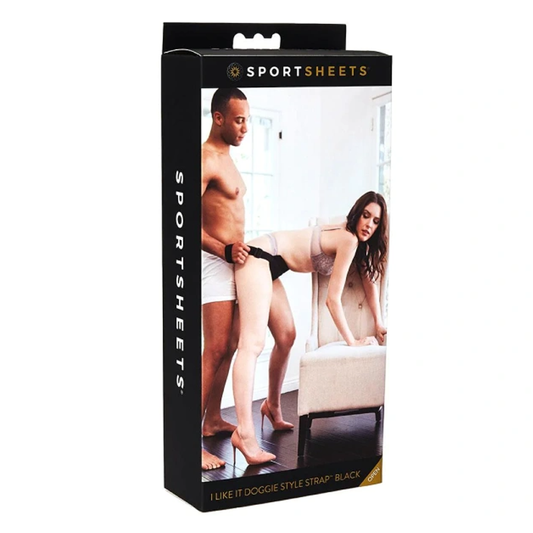 The product packaging shows a black box with an image of a couple in a doggy style position. The man is on top, and the woman is on her knees wearing a black bikini top.