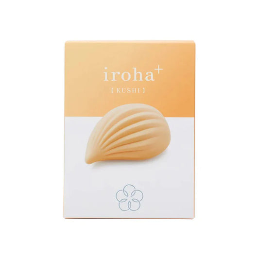 Tenga Iroha Kushi soft-touch ribbed vibrator – blush-colored, waterproof external massager with curved body and tapered tip.