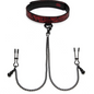 The image shows a black and red padded collar connected to adjustable nipple clamps by a chain. The collar has a satin-like texture on one side and a faux leather finish on the other, with a padded rose-print design.