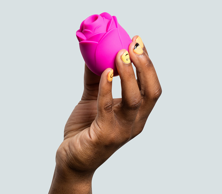 ROMP Rose stimulator with magnetic USB charger and safety instructions