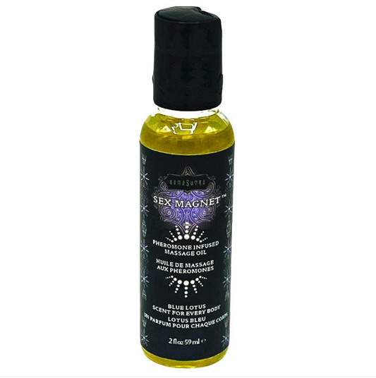 A bottle of Kama Sex Magnet Blue Lotus Massage Oil with a black cap and a yellow label, featuring text and the brand's logo.