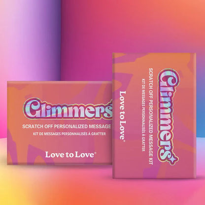 The image shows two boxes of the product 'Climmers', one with the text 'Love to Love' visible, indicating a scratch-off game kit for personalized messages. The background is colorful with shades of pink and purple.