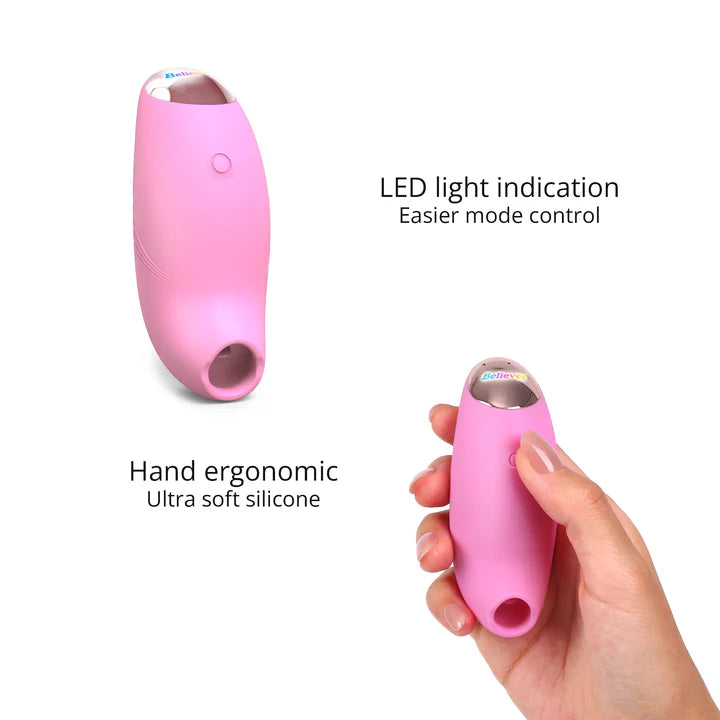 A small, ergonomically designed clitoral stimulator in blush pink, featuring a flapping silicone membrane and LED-lit button.
