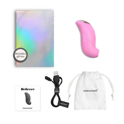 A small, ergonomically designed clitoral stimulator in blush pink, featuring a flapping silicone membrane and LED-lit button.