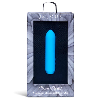 Vibrator with USB charger and sleeve laid on soft fabric