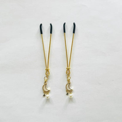 Gold nipple clamps with crescent moon, star charm, and pearl drop – PurpleNight.ca