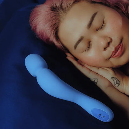 Dame Com Wand Vibrator in matte silicone with curved handle