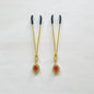 Gold nipple clamps with red-orange teardrop gem and crystal halo – PurpleNight.ca