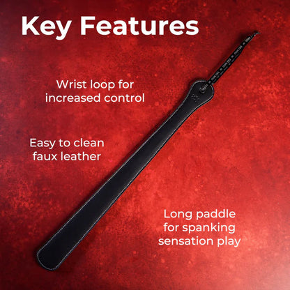 SEI MIO Rule My World Flexible Impact Paddle – black faux leather spanking paddle with wrist loop for BDSM and dominance play.