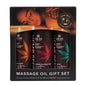 A packaging box containing three bottles of Earthly Body massage oil with different colored labels representing different scents, such as coconut lime, mango, and basil.