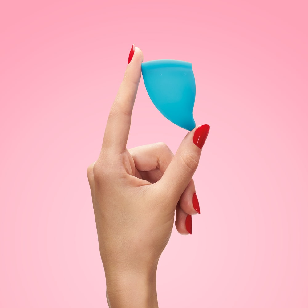 un Factory Fun Cup Explore Kit with two menstrual cups and black antimicrobial storage pouch