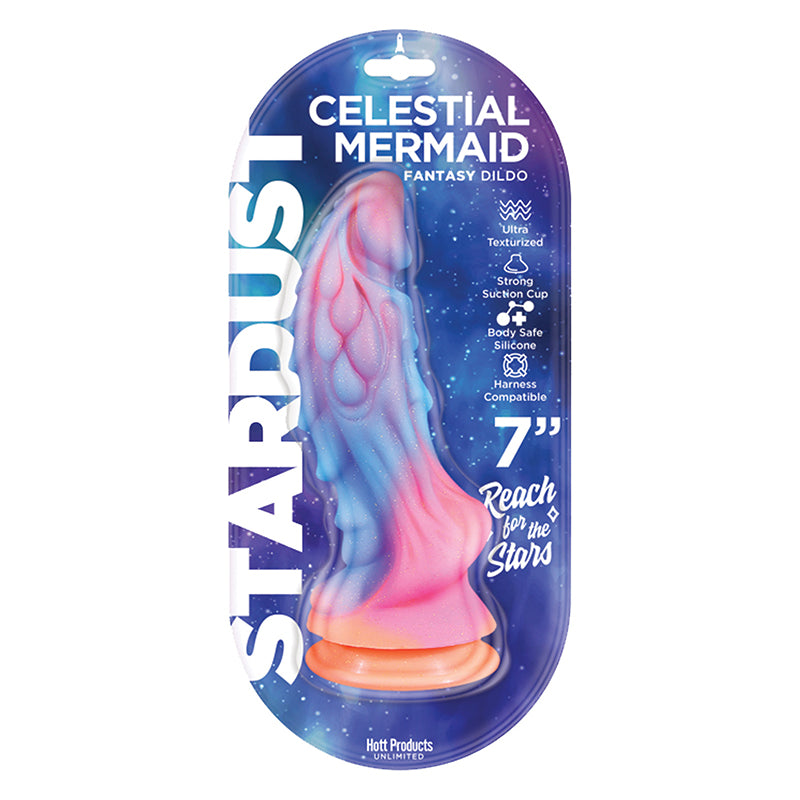 A pink silicone dildo with a mermaid design, packaged in a box with 'Celestial Mermaid' and 'Fantasy Dildo' text, indicating its theme and use.
