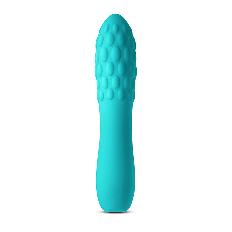 Travel-sized rechargeable vibrator with textured silicone body