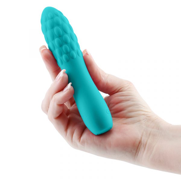Travel-sized rechargeable vibrator with textured silicone body