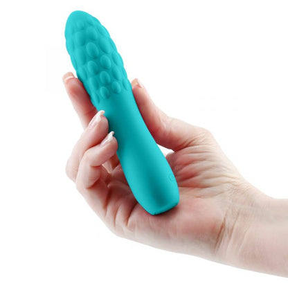 Travel-sized rechargeable vibrator with textured silicone body
