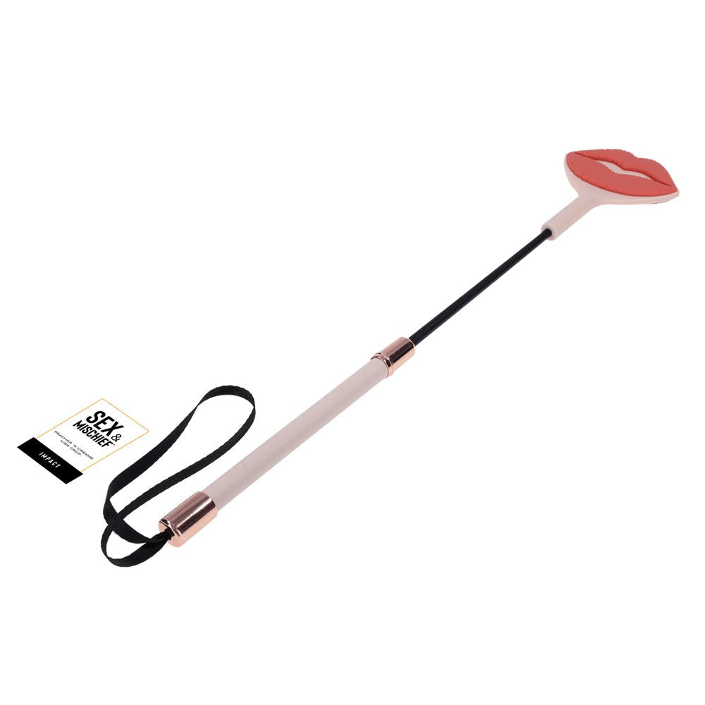 Sportsheets Peaches ’n CreaMe kiss crop with silicone lip-shaped tip and faux leather handle