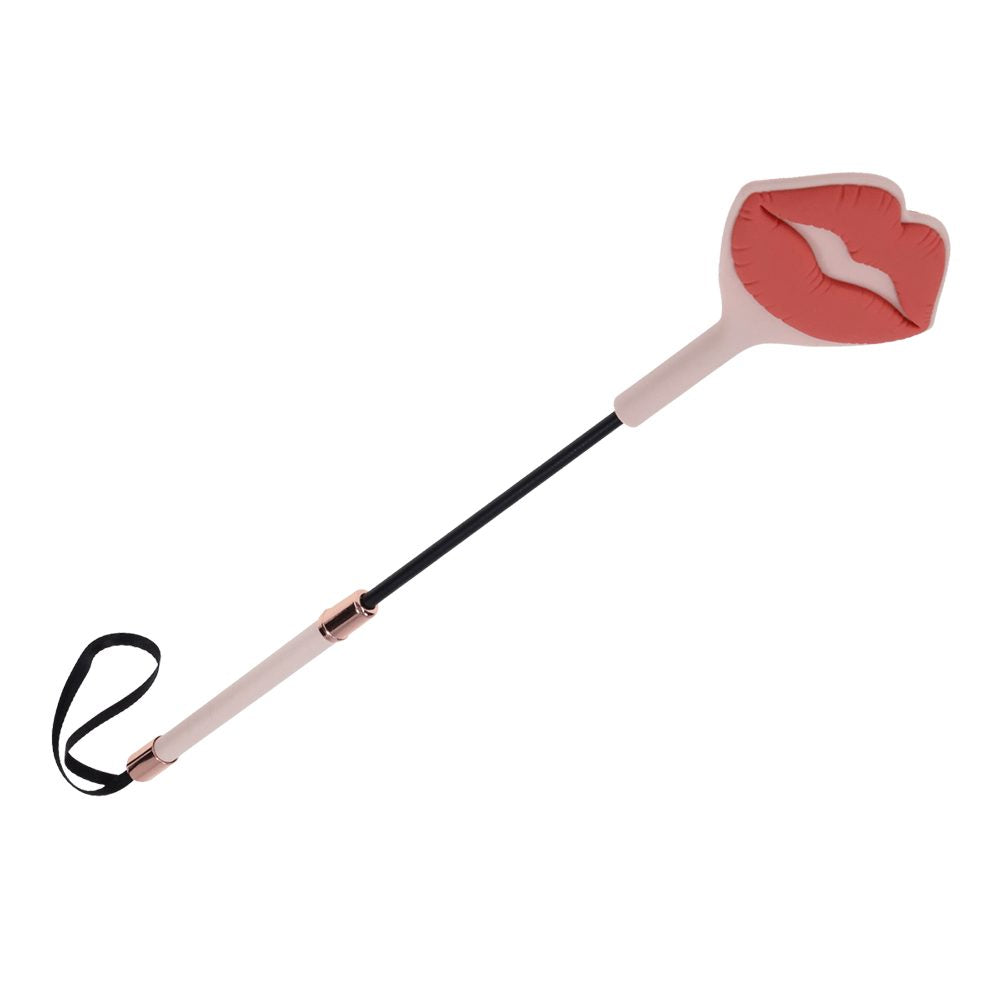 Sportsheets Peaches ’n CreaMe kiss crop with silicone lip-shaped tip and faux leather handle