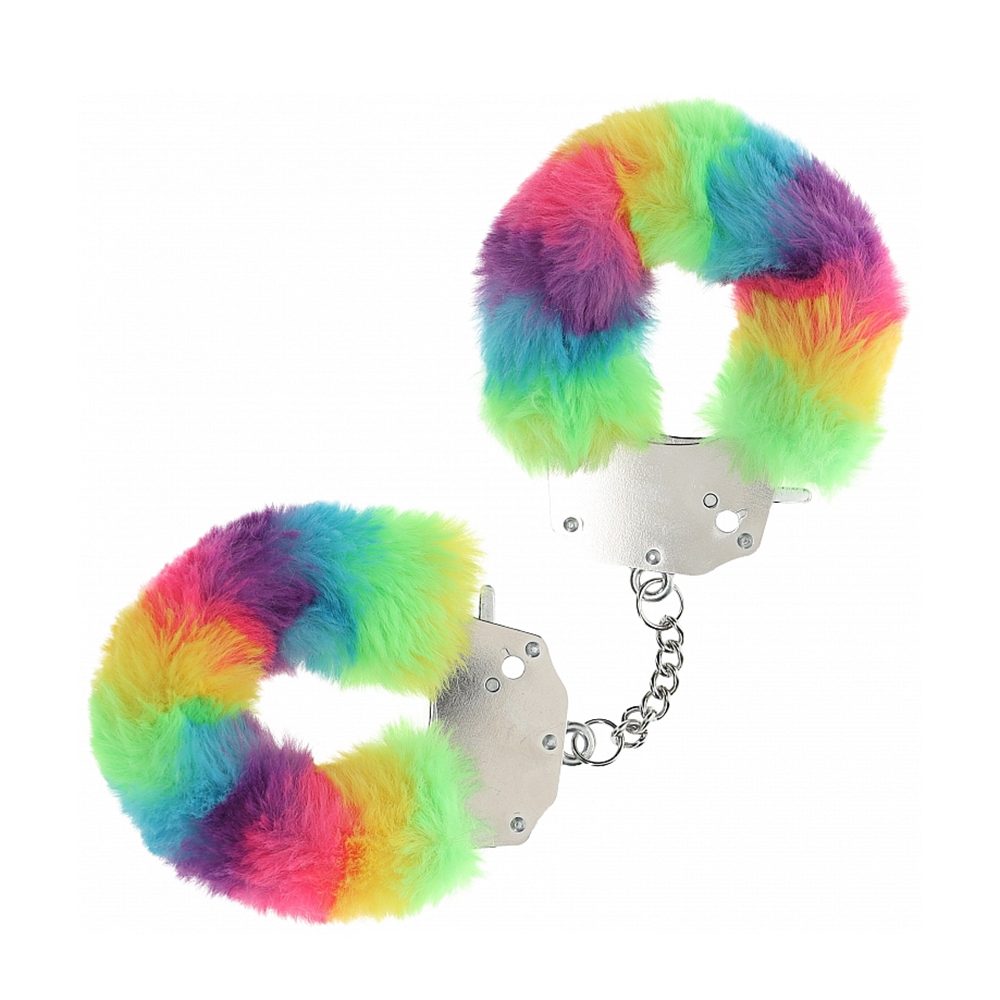 Colorful fuzzy handcuffs on a white background